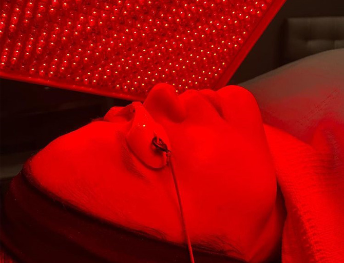 Stock image of a girl undergoing LED light therapy